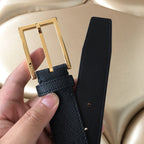 Prada belt set with gold-tone buckle and matching dark strap with rivet details