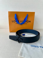 Louis Vuitton leather belt in dark blue with star buckle and dust bag