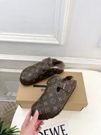 Louis Vuitton monogram clogs with two straps, buckles, and faux-fur lining