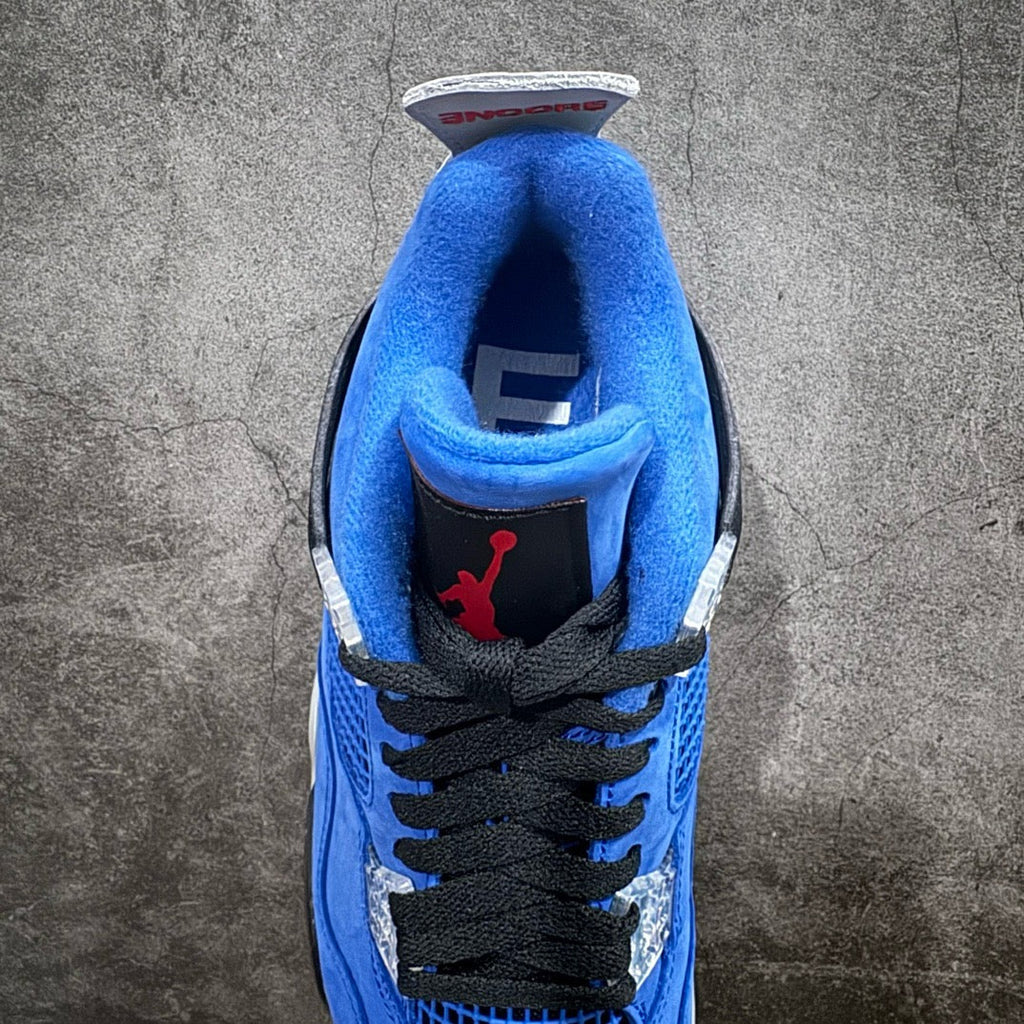 Air Jordan 4 sneakers tongue and lace area in blue with Jumpman logo and black lining
