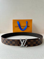 Louis Vuitton Damier check belt with shiny silver V buckle and dark brown strap