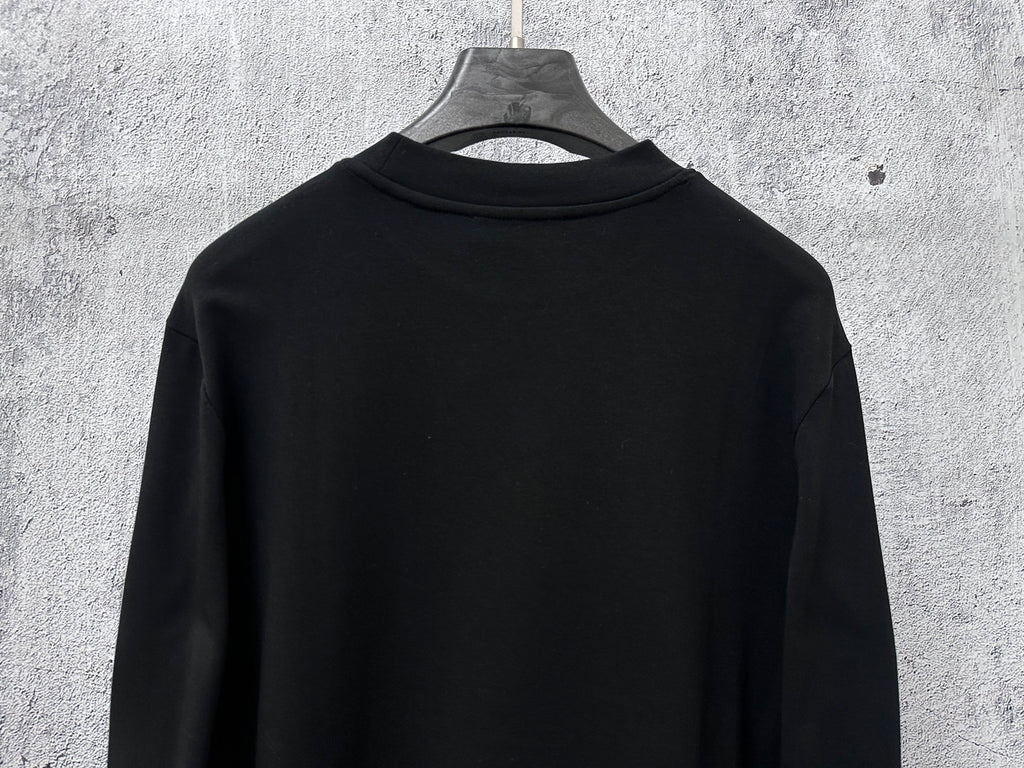 Black long-sleeve sweatshirt back view, plain design