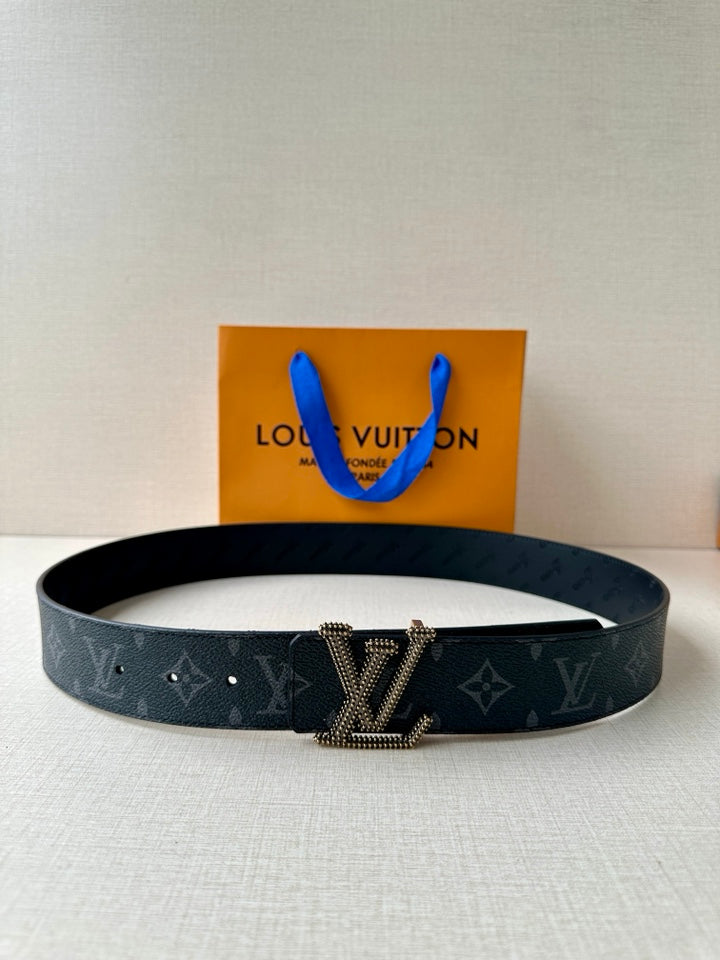 Louis Vuitton belt in dark blue/black monogram canvas with LV buckle and prong holes