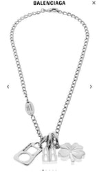 Balenciaga silver pendant necklace with BB and clover charms on a chain