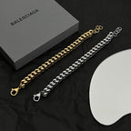 Gold and silver chain bracelets with link design and round ring clasp
