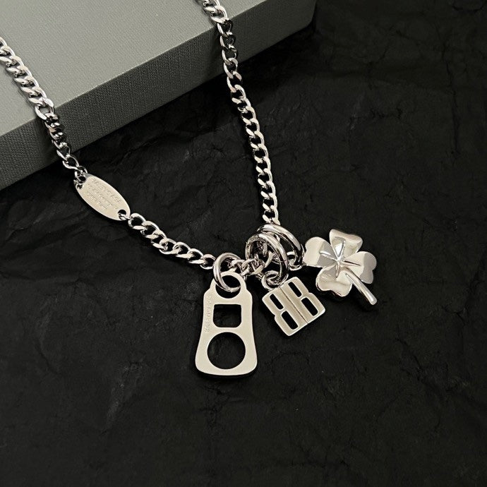 Balenciaga silver pendant necklace with keyhole and BB charms and clover detail