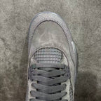 Gray suede sneaker toe with textured mesh underlay and lace-up front