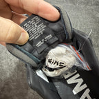 Black sneaker tongue lining with printed interior label and lace opening
