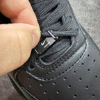 Black sneaker lace-up with small "AMBUSH" tag on tongue area