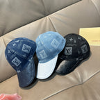 Assorted Louis Vuitton caps: dark blue, light blue, and dark monogram baseball cap