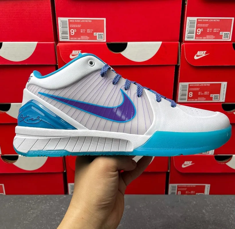Nike Zoom Kobe 4 Protro sneakers, white upper with blue swoosh and blue lace trim