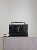 Black YSL leather shoulder bag with gold-tone chain and YSL logo at front flap.
