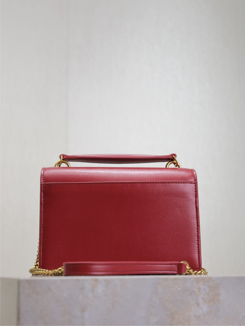 YSL red leather shoulder bag with top handle and chain strap