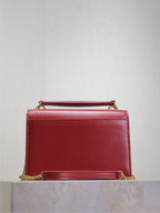 YSL red leather shoulder bag with top handle and chain strap