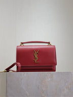 YSL red leather shoulder bag, front flap with gold YSL logo