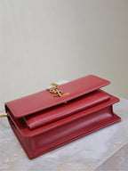 YSL red leather flap bag with gold YSL logo on front