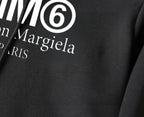 Black hoodie fabric close-up with MM6 Maison Margiela logo print