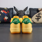 Nike Air Force 1 sneakers, yellow with green heel tabs and yellow gum sole