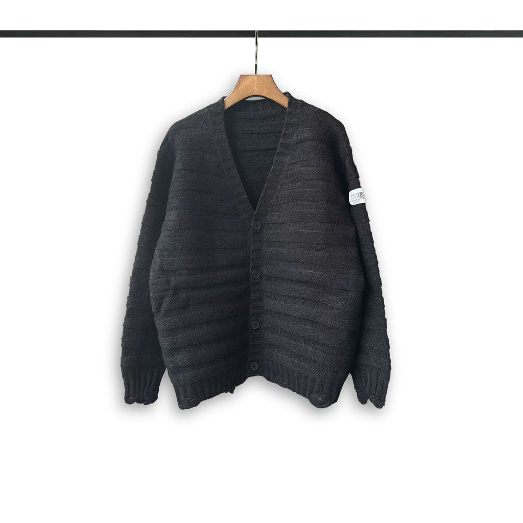 Maison Margiela dark knit cardigan with V-neck, button front, and ribbed texture