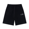 Black drawstring shorts with elastic waistband and side pockets