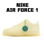 Air Force 1 low-top sneaker in pale yellow leather with green HY tag and white swoosh