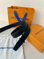Navy leather belt with star emblem, shown with Louis Vuitton gift bags and tissue