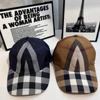 Burberry cap pair: tan and navy plaid designs with curved brims