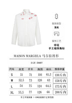 White button-up shirt with red lip print, long sleeves