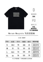 Black crewneck T-shirt with white square dot logo print, short sleeves