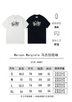 Maison Margiela T-shirt (white and black) with chest graphic; size chart shown