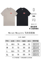 Two T-shirts with size chart: beige and black, 'I'm a fan' logo on chest