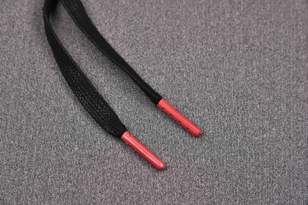 Black sneaker laces with red tips