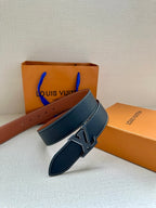 Louis Vuitton belt, dark blue leather with silver LV buckle and tan reverse side