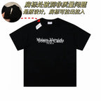 Black crewneck T-shirt with Maison Margiela PARIS logo print and small tag