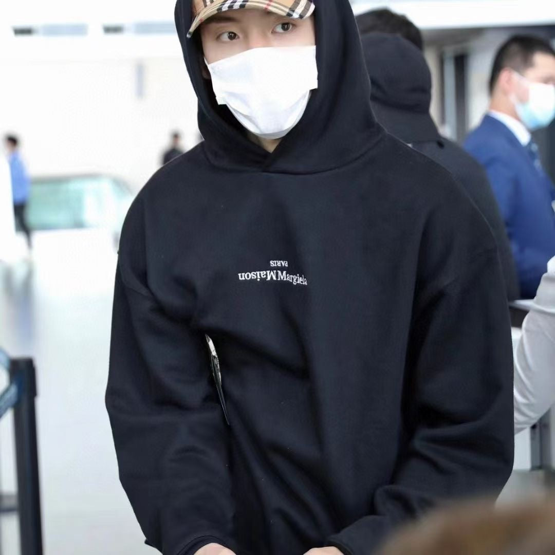 Navy pullover hoodie with drawstring hood and small chest logo