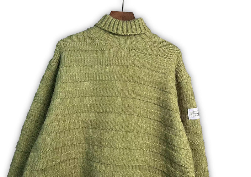 Bright green turtleneck knit sweater with ribbed collar and horizontal knit lines