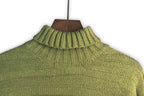 Bright green knit turtleneck with ribbed collar and seamless ribbed panel lines