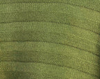 Olive green knit fabric close-up with fine textured weave