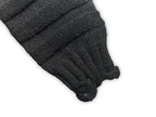 Dark charcoal knit sleeve with ribbed cuffs and stitched texture
