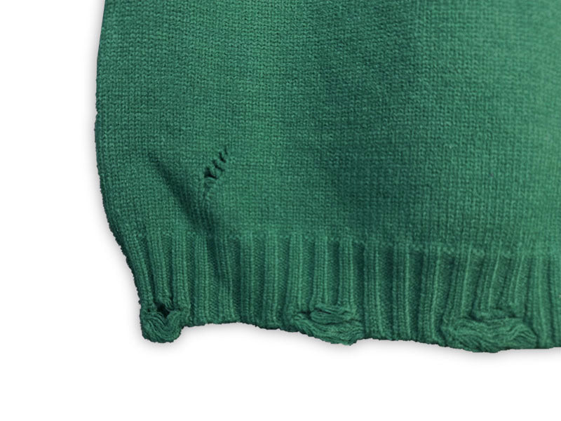 Green knit sweater vest hem with ribbed trim