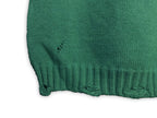 Green knit sweater vest hem with ribbed trim
