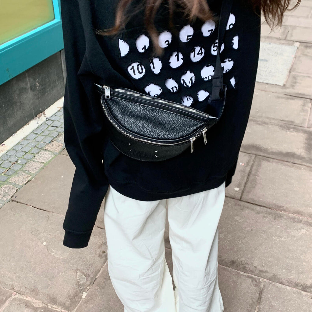 Maison Margiela hoodie with white icon graphic, black long sleeves