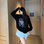 Black pullover hoodie with front number graphic, worn on model with hands behind head