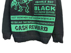 Dark crewneck sweatshirt close-up with “BLACK” panel and “CASH REWARD” text
