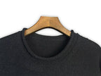 Dark crewneck sweatshirt neckline view with ribbed collar and short pile texture