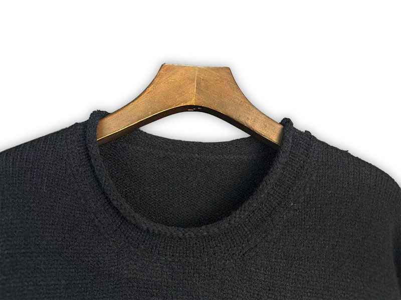 Dark crewneck sweatshirt neckline view with ribbed collar and short pile texture