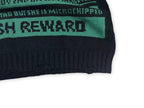 Green knit sweater with ribbed hem and partial graphic stripe