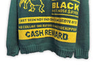 Green knit sweater with graphic text panel and ribbed cuffs