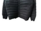 Maison Margiela dark knit cardigan close-up with button front and ribbed hem