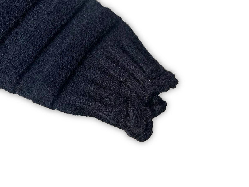 Knit cardigan sleeve cuff in dark fabric with ribbed trim